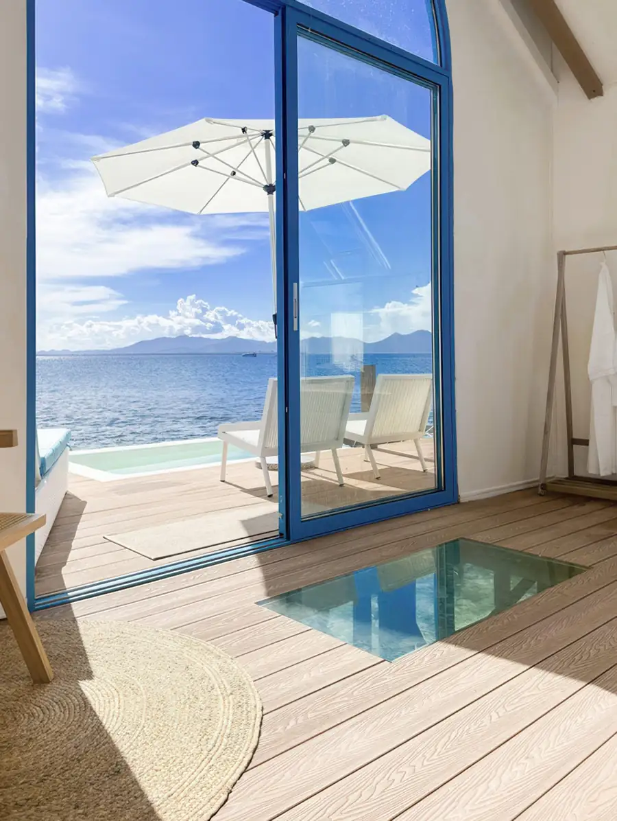 Glass floor panel and private balcony in Couple Suite Royal Resort Semporna