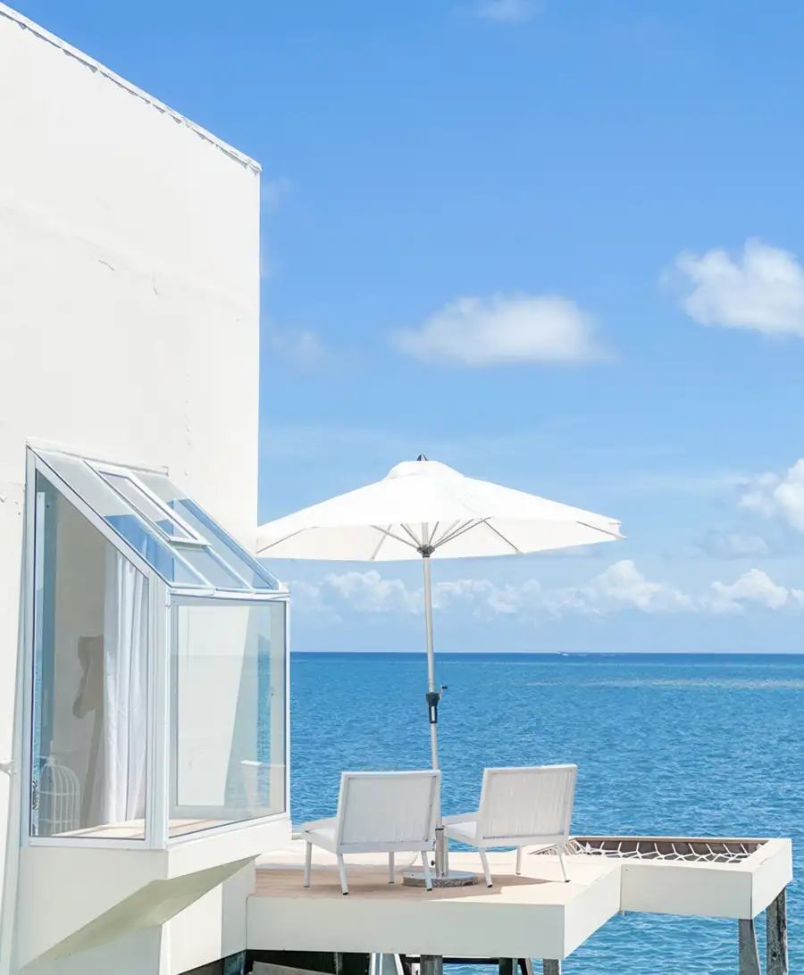 Private mesh lounge area on Family Suite balcony Royal Resort Semporna
