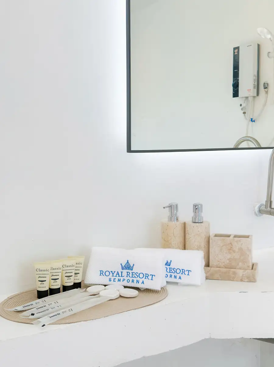 Sleek dark vanity bathroom in Family Suite Royal Resort Semporna